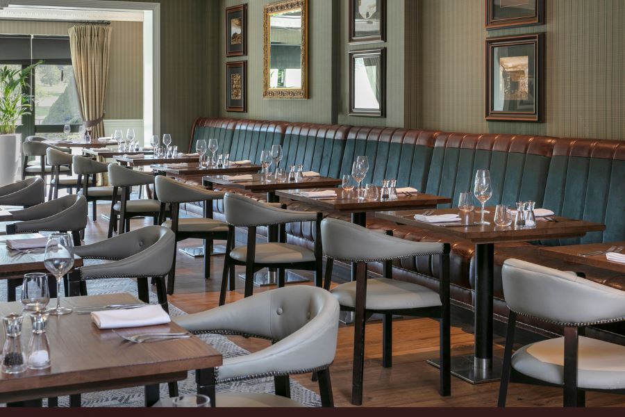 Tables and chairs in the restaurant at Slaley Hall Hotel, Spa And Golf Resort