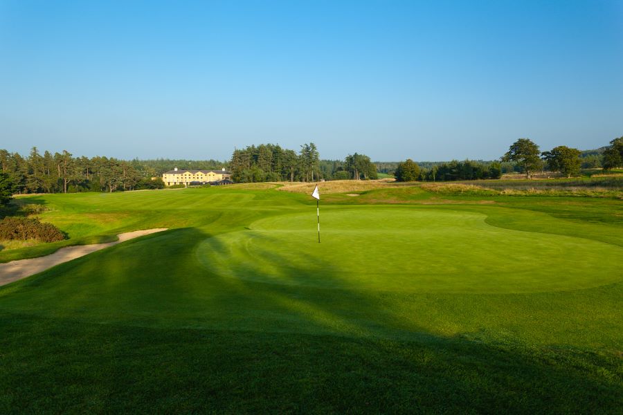 Main building in the distance with putting green in the foreground at Slaley Hall Hotel, Spa And Golf Resort
