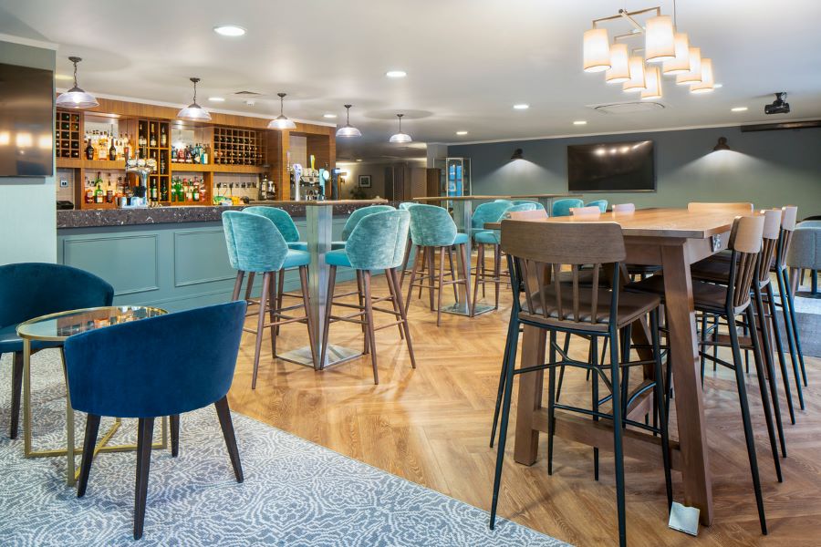 Blue stools in bar area at The Telford Hotel, Spa And Golf Resort