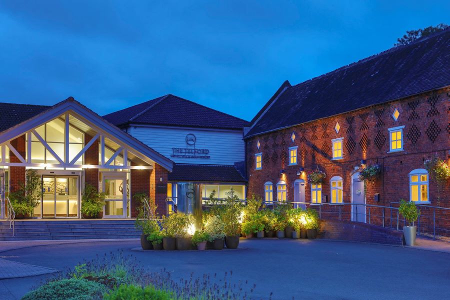 Evening at The Telford Hotel, Spa And Golf Resort with lights in courtyard
