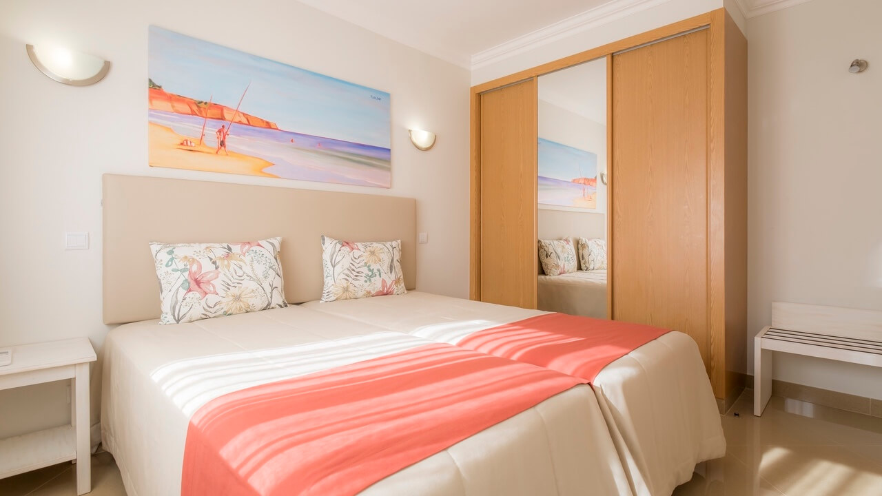 Twin bedroom in an apartment at Boavista Golf Resort And Spa