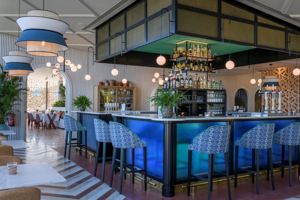 Bar with stools at Las Colinas Golf And Country Club
