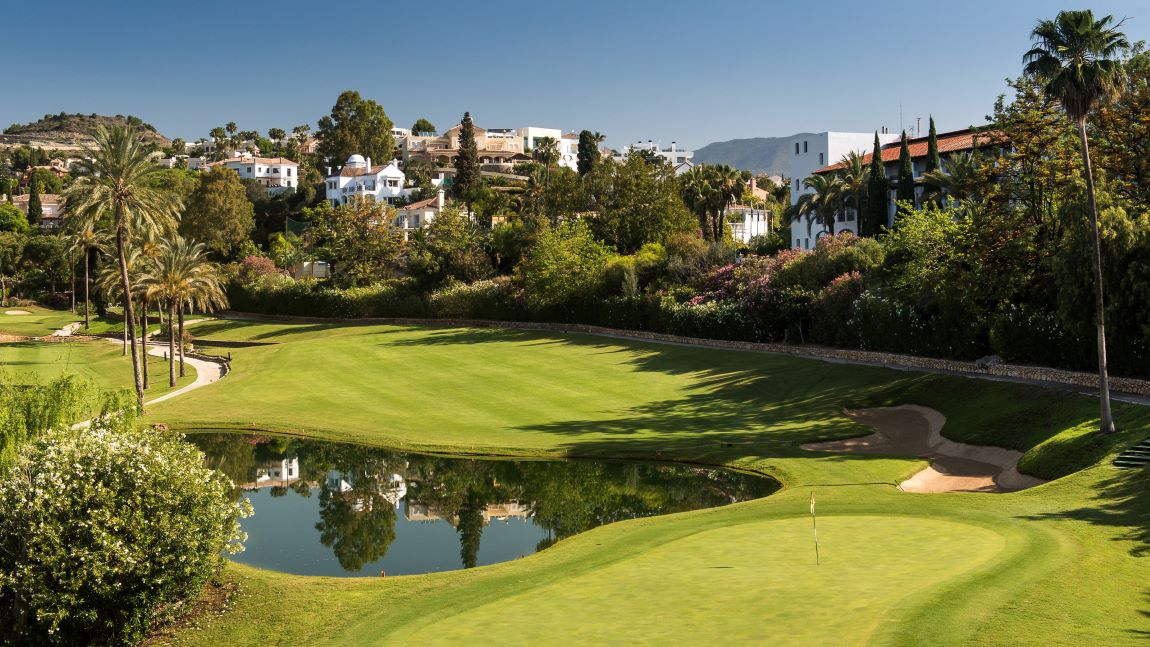 Fairway with lake to the left and real estate overlooking the golf course at The Westin La Quinta Golf Resort & Spa