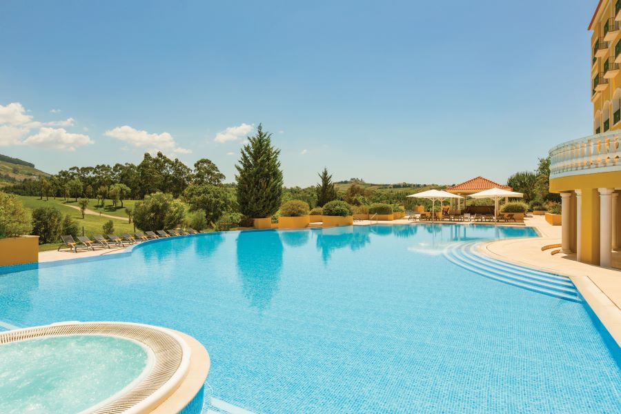 Outdoor swimming pool at Dolce by Wyndham CampoReal Lisboa