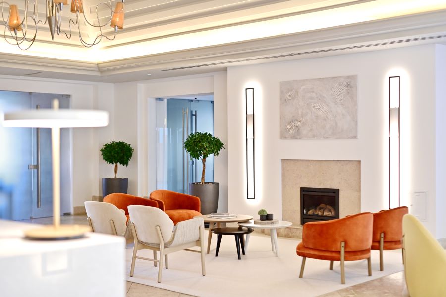 Orange and grey chairs at Dolce by Wyndham CampoReal Lisboa