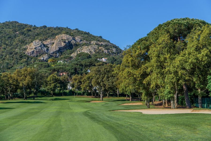 Blue sky and mountain back drop on the golf course at Club de Golf Costa Brava
