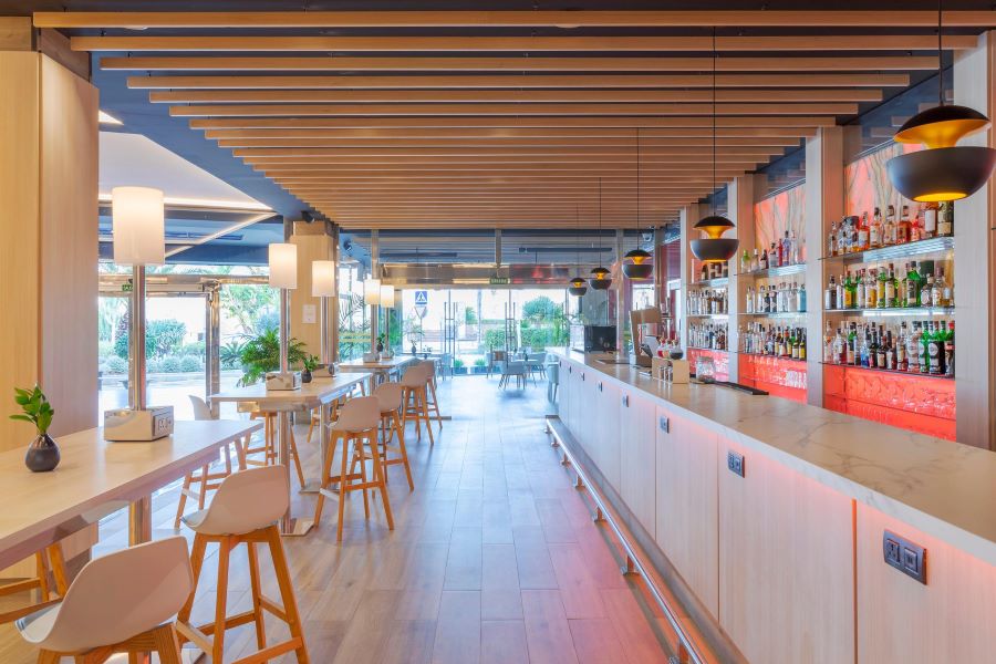 Large bar in hotel with seats outside at Melia Alicante in Costa Blanca