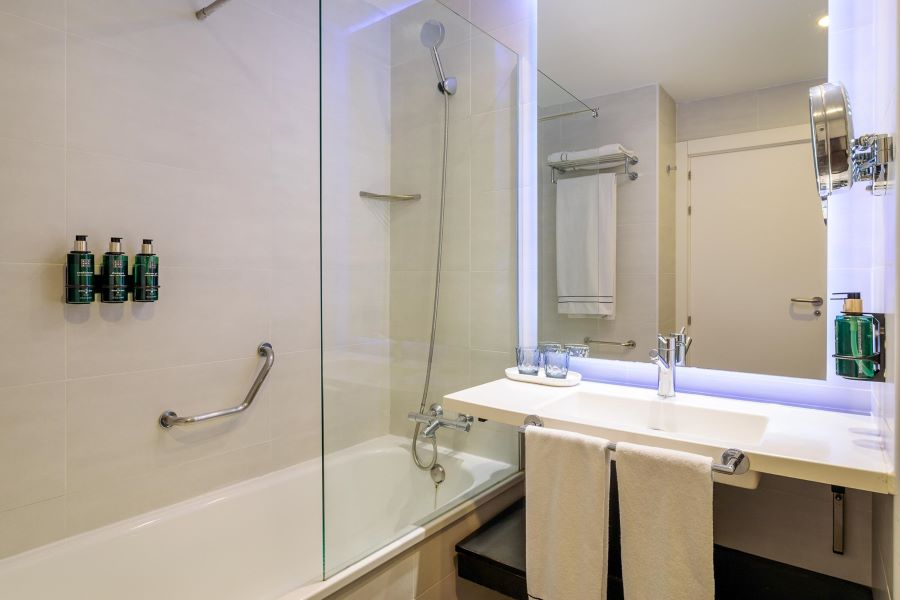 Bathroom with glass shower at Melia Alicante Hote in Spain