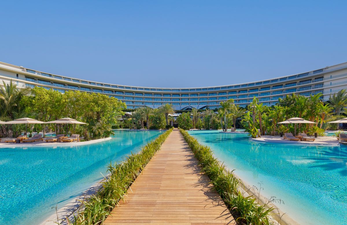 Bridge through swimming pool at Maxx Royal Golf & Spa