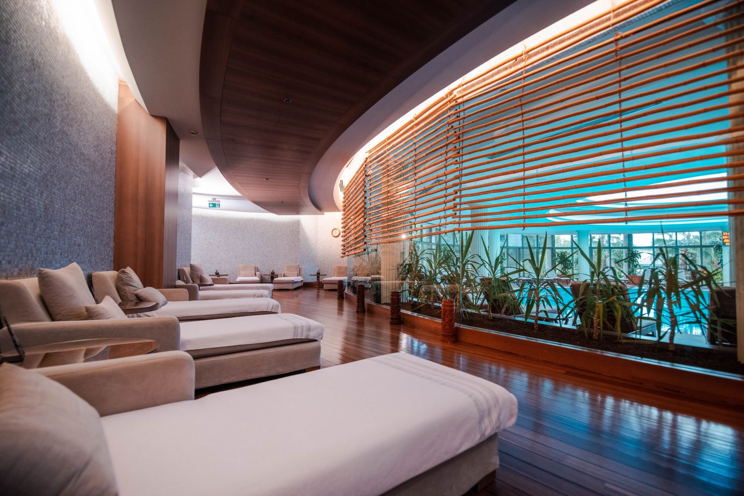 Loungers looking into the pool at Gloria Golf Resort
