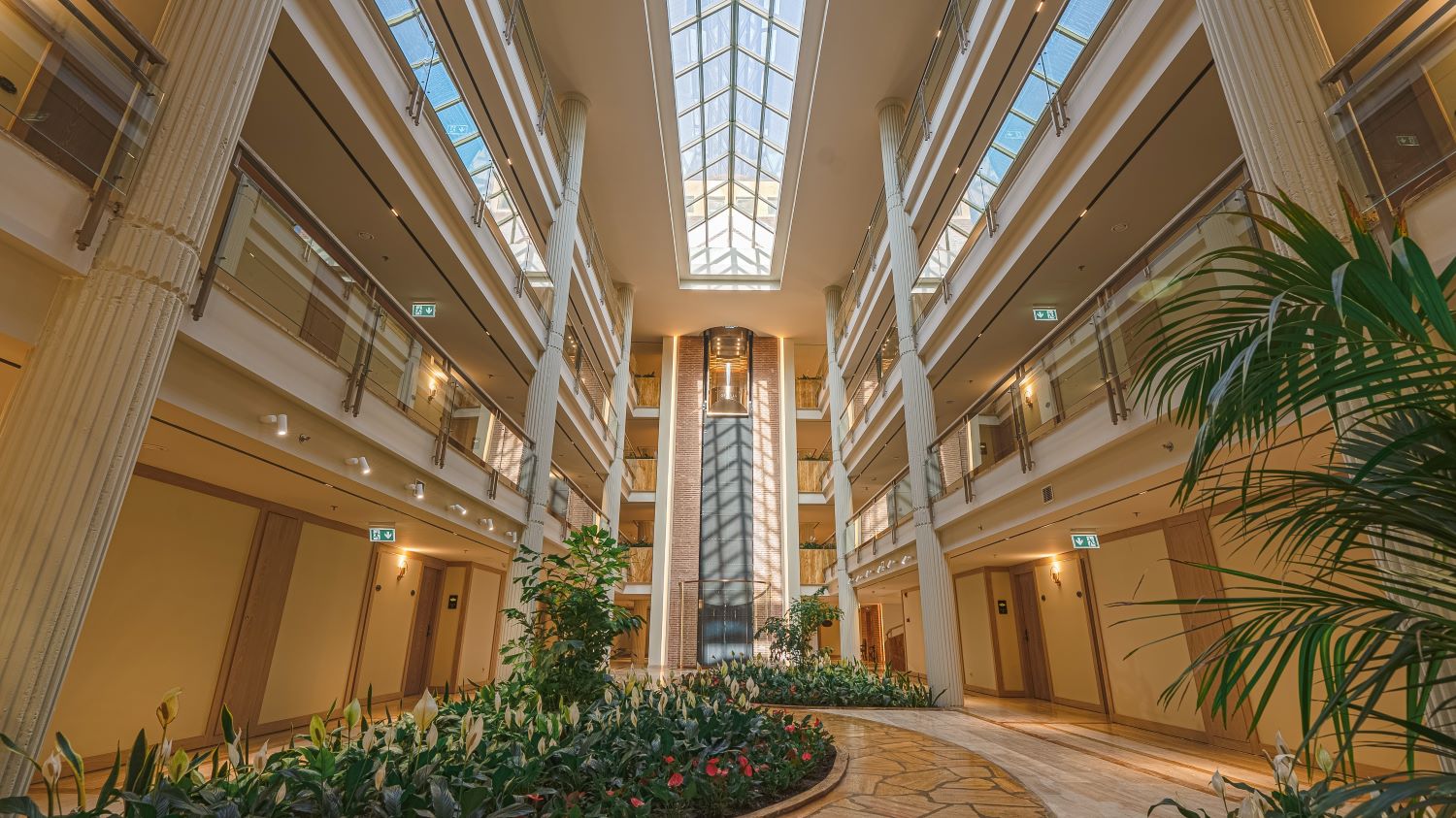 Lobby outside bedrooms in main building at Gloria Golf Resort