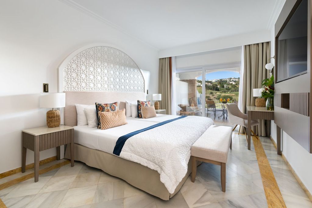 Bedroom with double bed at La Cala Golf Resort in Costa Del Sol