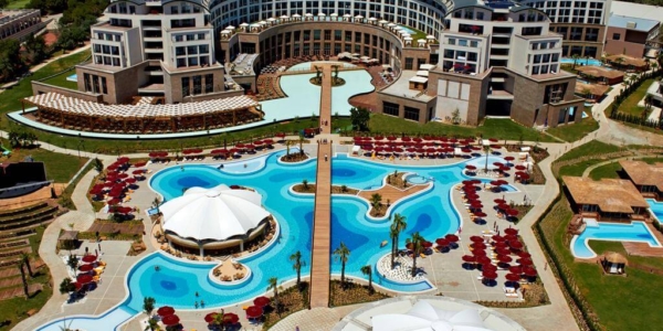 Kaya Palazzo Golf Resort from the air with the swimming pools in the foreground