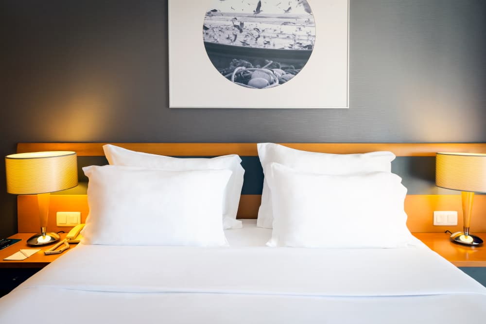 Pillows on the bed at Sana Sesimbra Hotel in Portugal's Lisbon