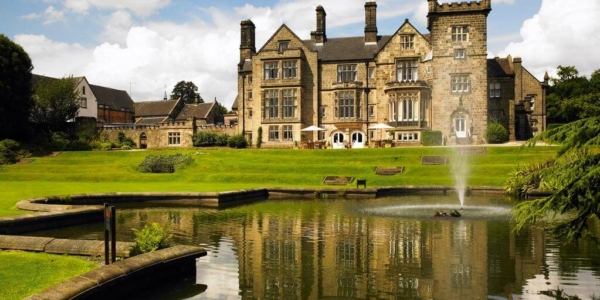 Rear view of Breadsall Priory Marriott Hotel And Country Club with the pond and fountain in the foreground