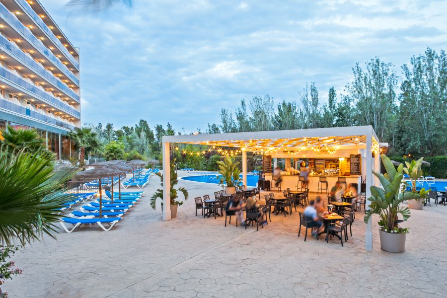 Pool bar in the evening at Sol Costa Daurada by Melia