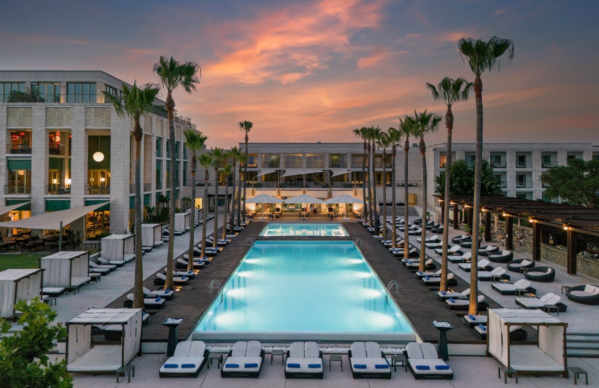 Anantara Vilamoura resort's swimming pool at sunset