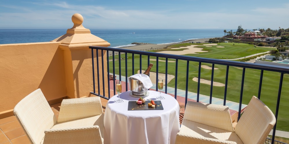 Private balcony overlooking golf course and the sea at Guadalmina Hotel Spa And Golf Resort