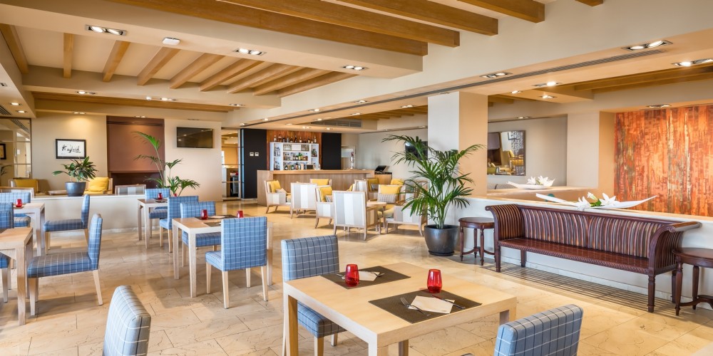 Bar area with seating at Guadalmina Hotel Spa And Golf Resort