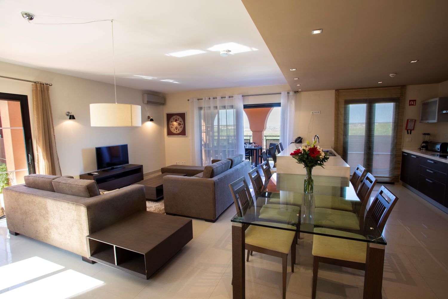 Dining area in villa at Amendoeira Golf Resort in Portugal
