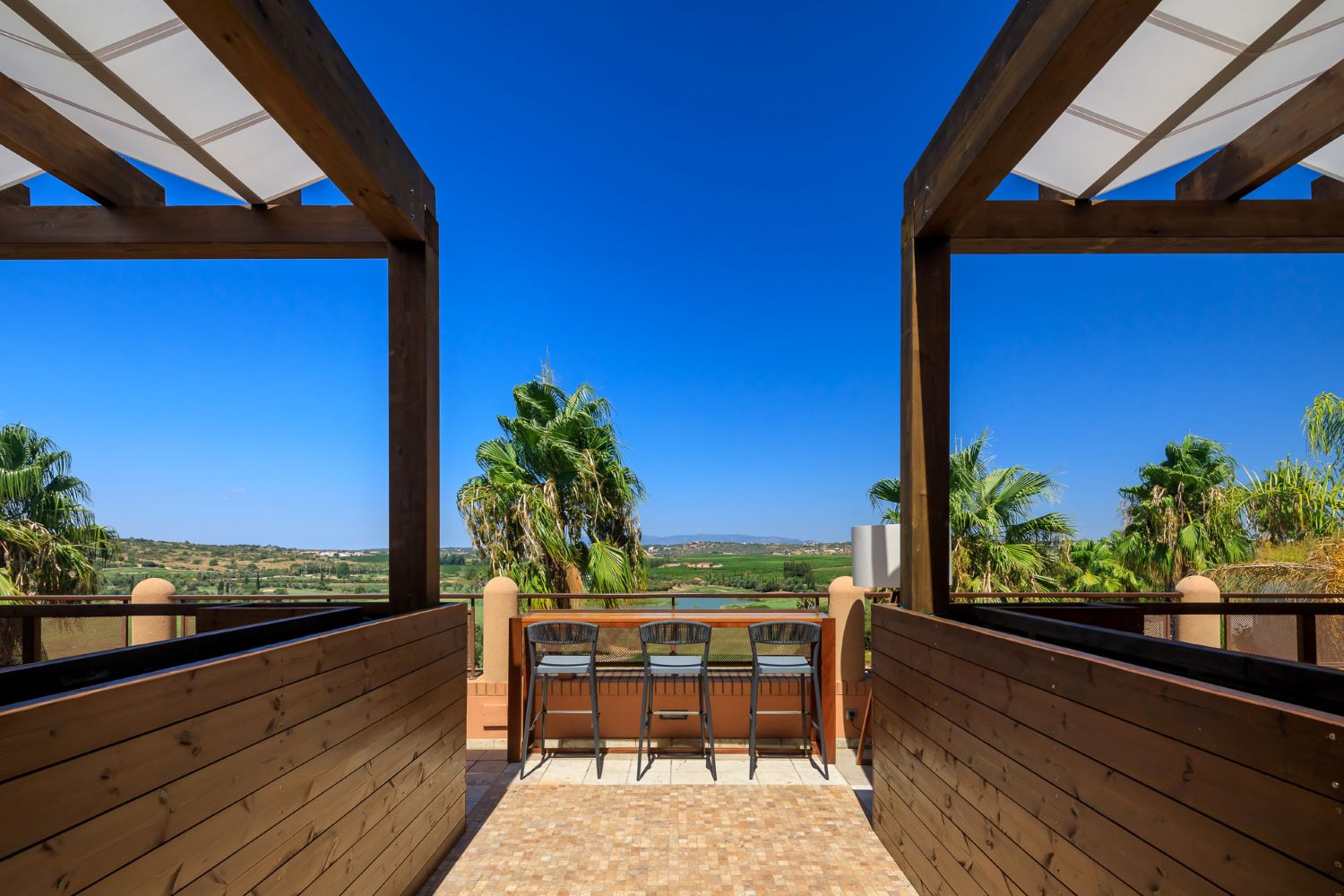 Outdoor seating at Amendoeira Golf Resort