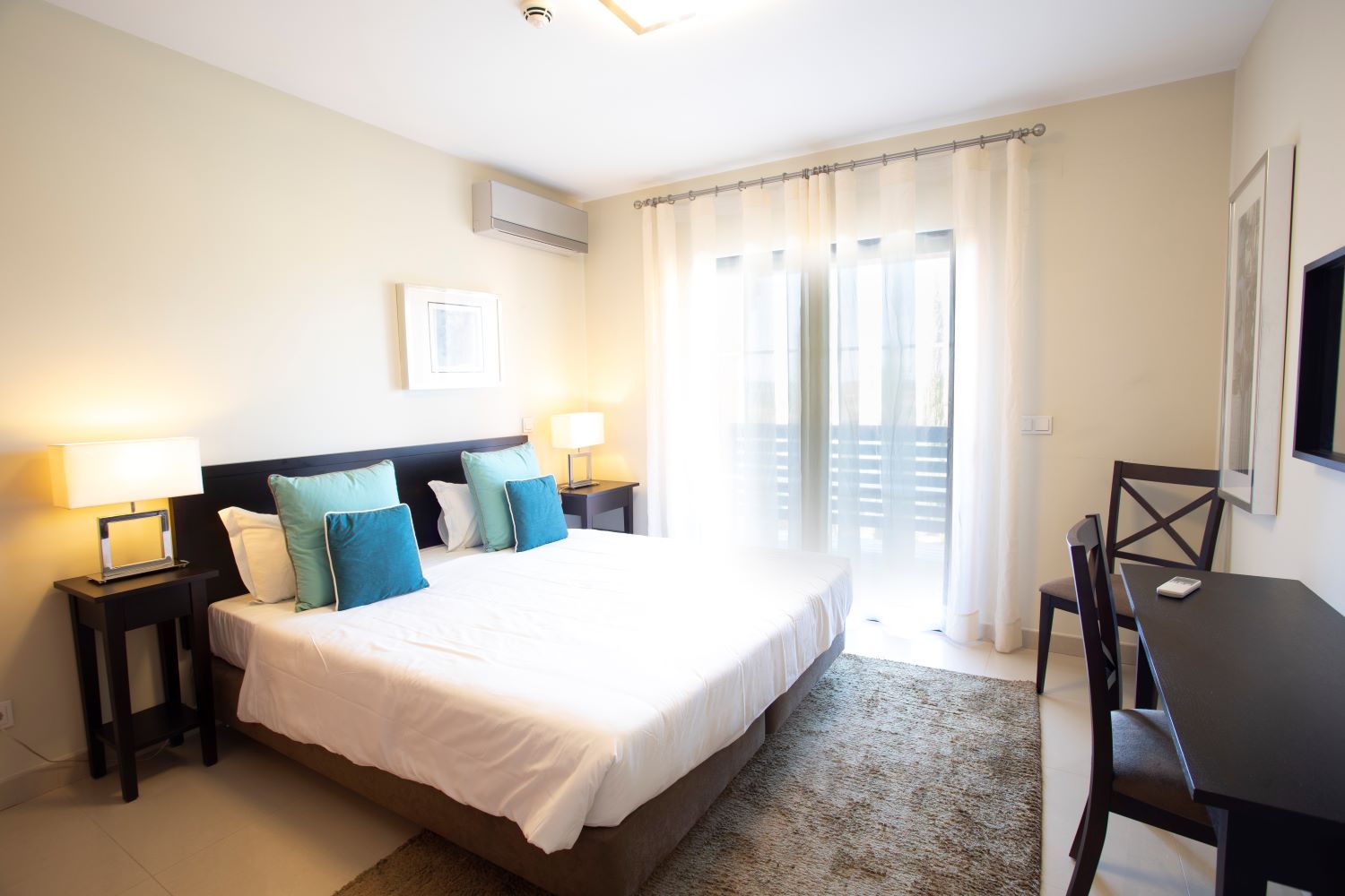 Bedroom in a villa at Amendoeira Golf Resort in Portugal's Algarve region