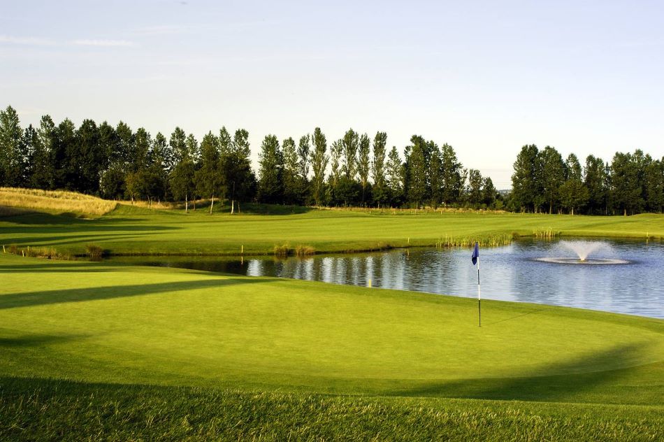 Water surrounding the green on the Brabazon course at The Belfry Hotel & Golf Resort