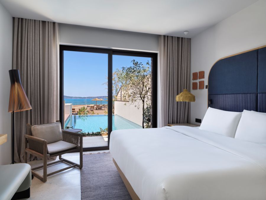 Bedroom with infinity pool at W Costa Navarino
