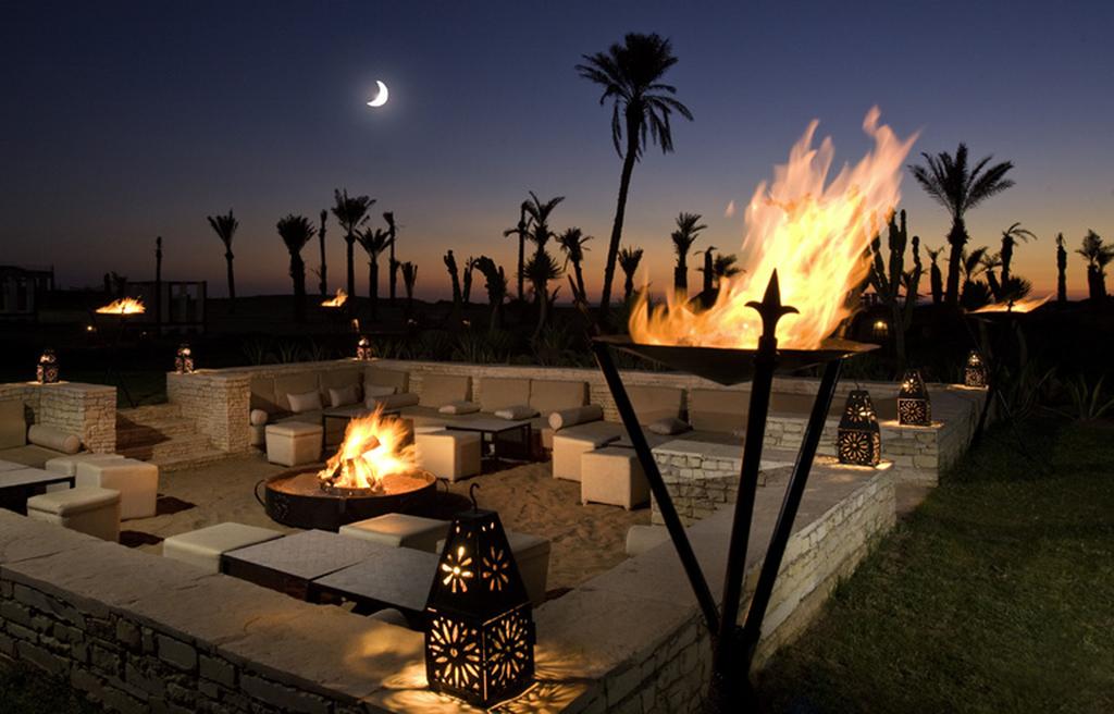 Hotel Sofitel Agadir Royal Bay Resort outdoor firepit with cubed seats at night