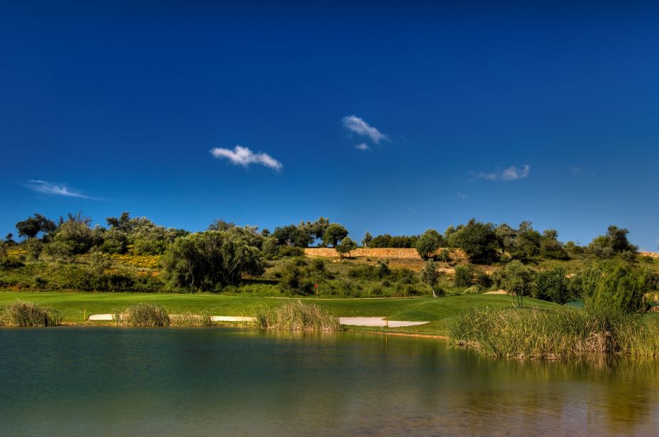 Pestana Silves Golf Course in the Algarve with lake protecting the green