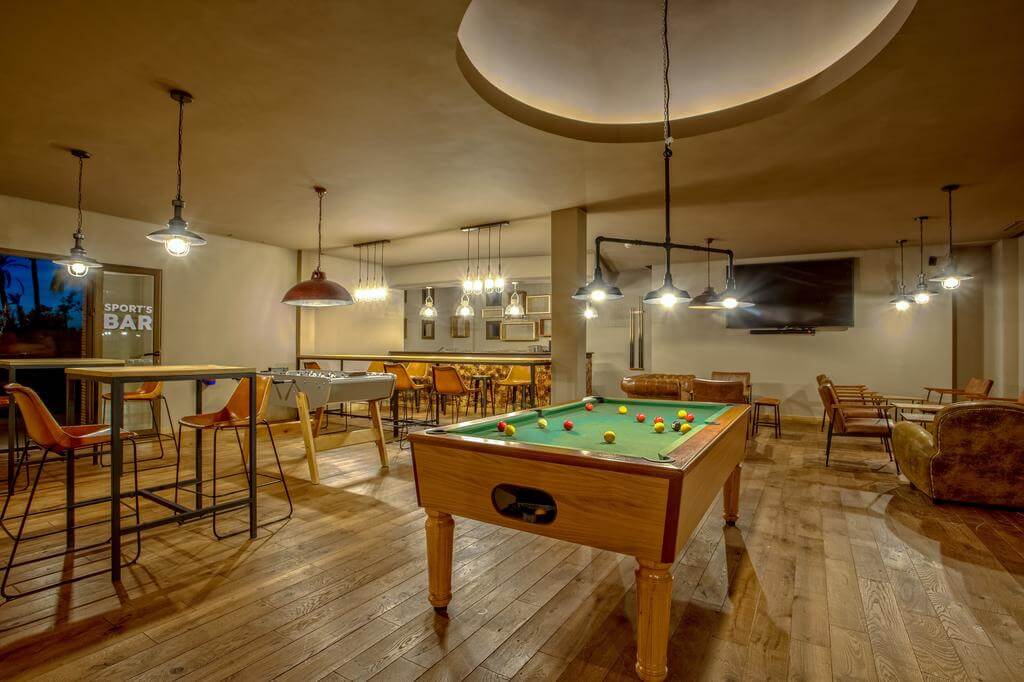 Be Live Collection Marrakech Adults Only bar with pool table, flat screen television, table football, and leather chairs
