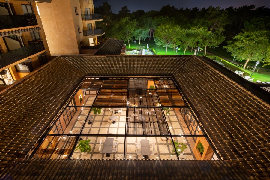 Patio area at night at DoubleTree by Hilton Islantilla Beach Golf Resort in Huelva, Spain