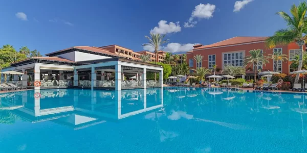 H10 Costa Adeje Palace's outdoor swimming pool with bar