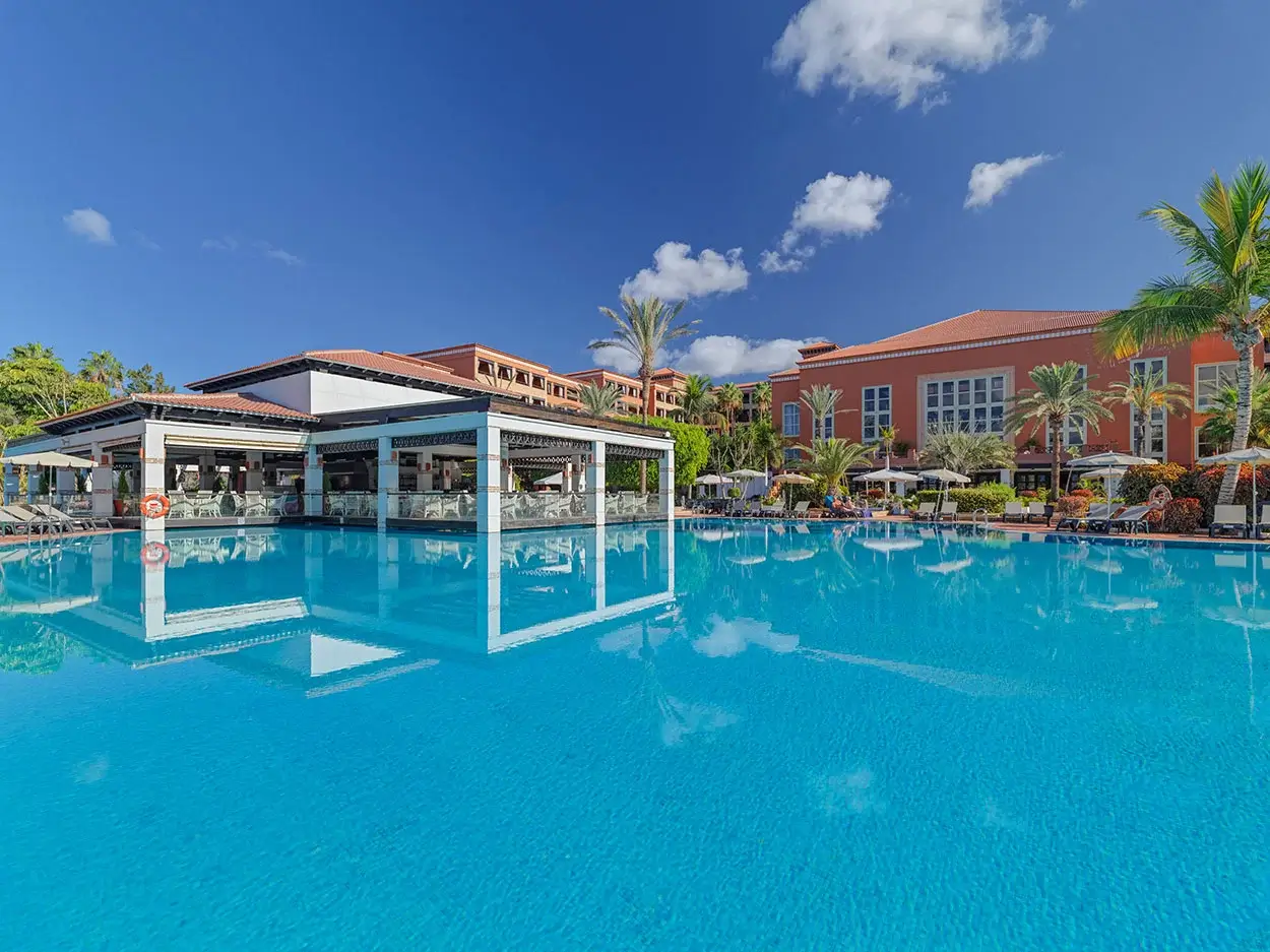 H10 Costa Adeje Palace's outdoor swimming pool with bar