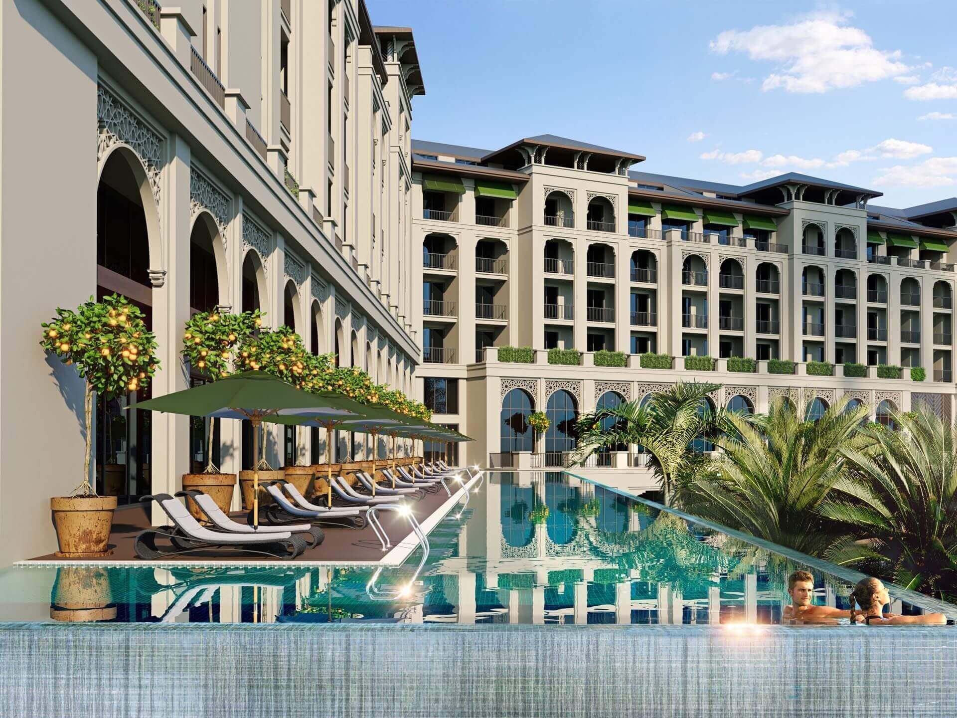 Cullinan Belek resort in Turkey, overlooking the swim up rool with sun loungers and palm trees