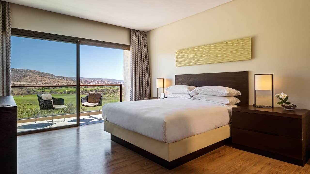 Double bed at Hyatt Place Taghazout Bay with views out to the terrace