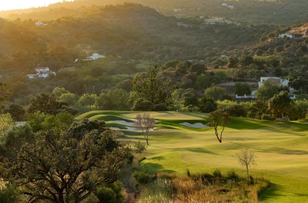 Ombria Golf Resort protected by trees
