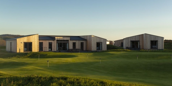 Accommodation Lodges at Dundonald Links overlooking the putting green