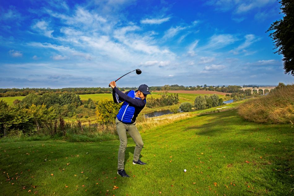 Golfer on the tee at Roxburghe Hotel And Golf Course in the Scottish Borders
