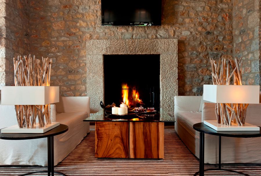 Lobby area with fireplace at The Westin Resort Costa Navarino