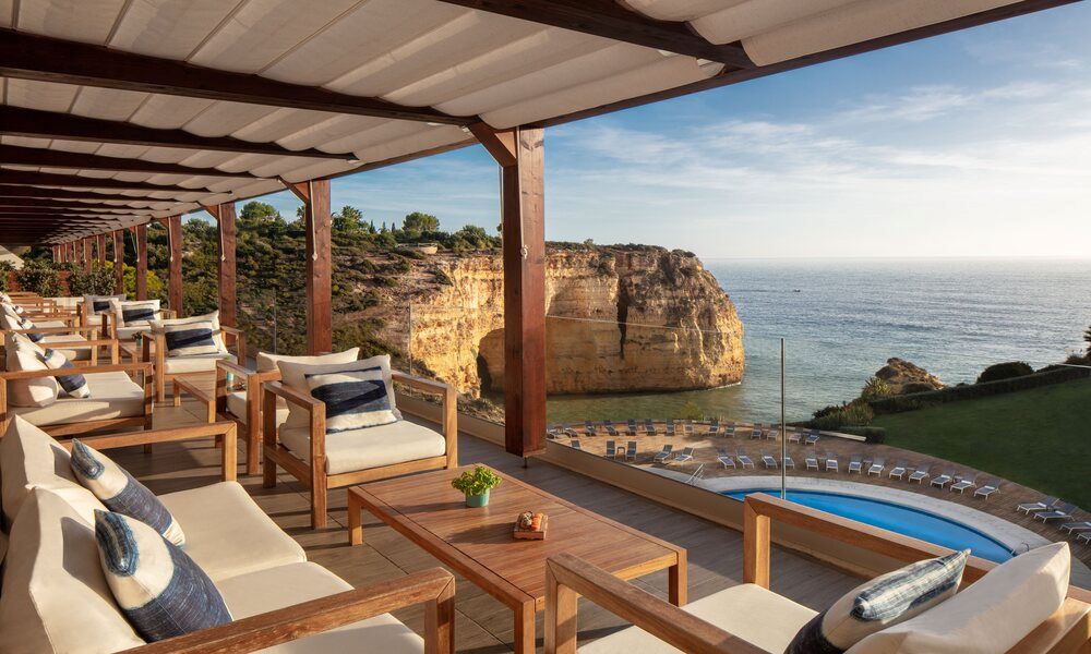 Outdoor seating in bar at Tivoli Carvoeira Algarve Resort in Portugal