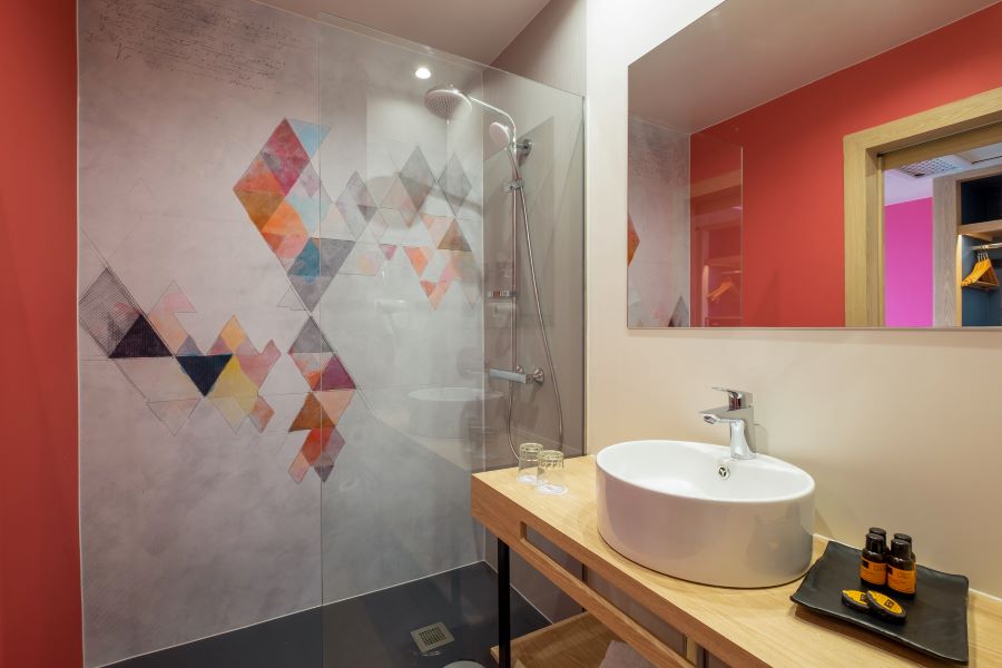 Bathroom with shower unit and sink at Agadir Allegro in Morocco