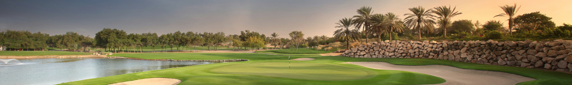Panorama shot of golf course in the UAE at sunset