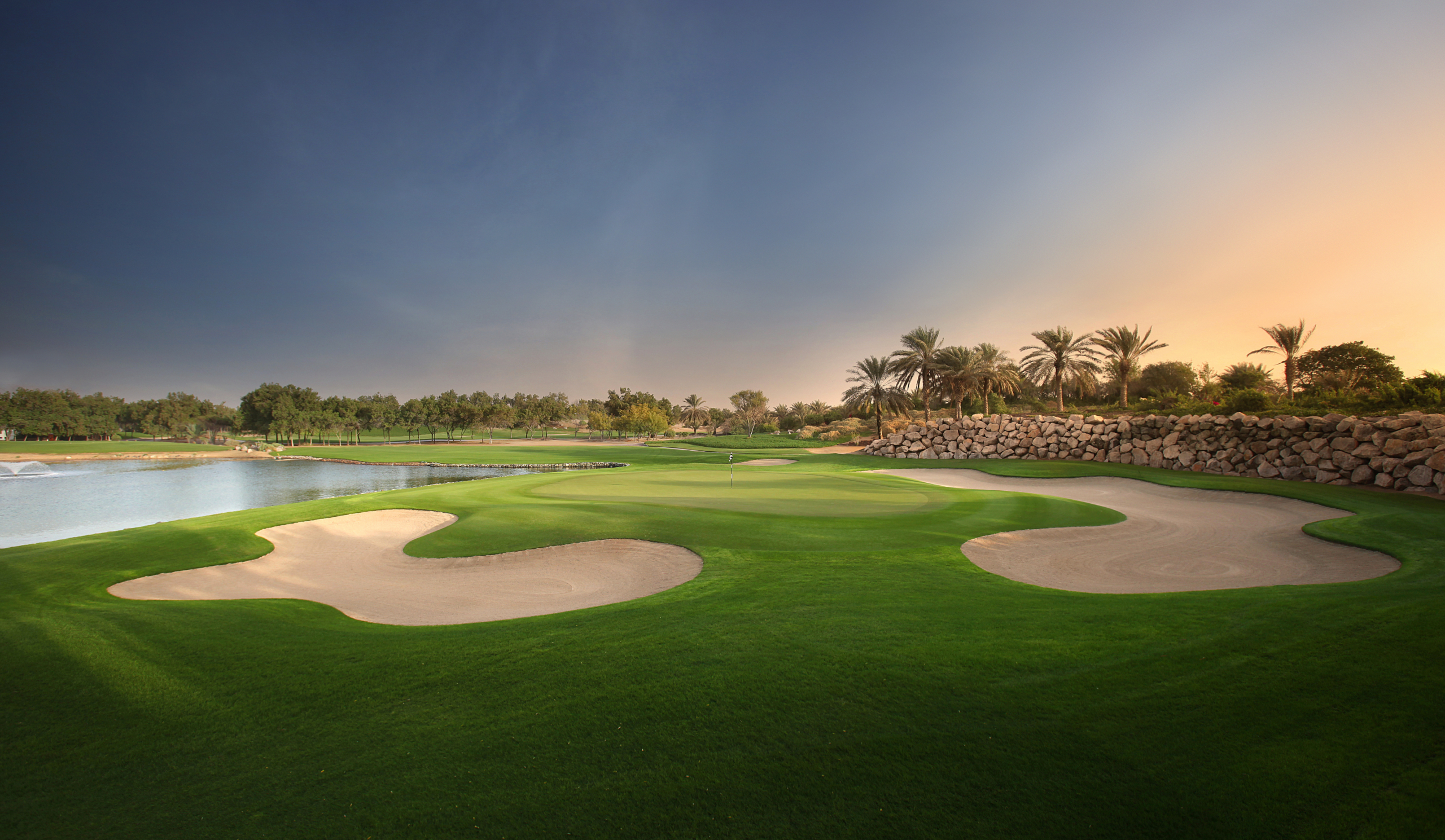 Panorama shot of golf course in the UAE at sunset