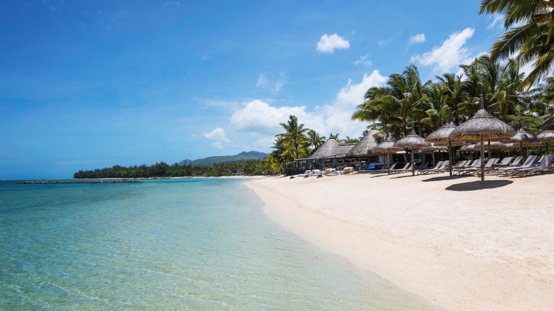 White sand beach against the sea at Heritage Awali Golf & Spa Resort