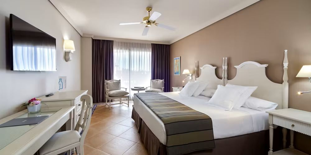 Large double bed with balcony at Barcelo Marbella Hotel