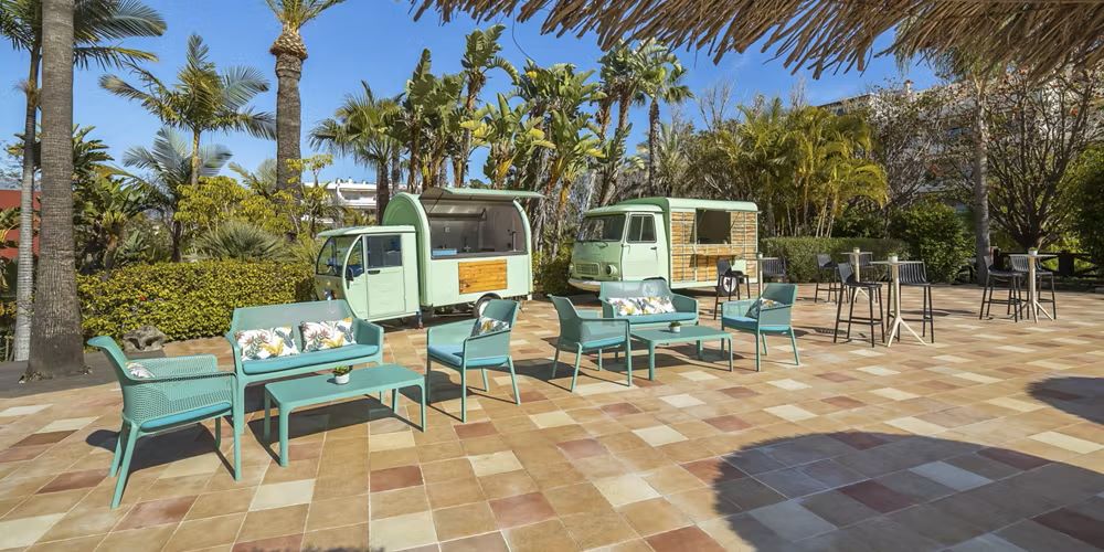 Food trucks in courtyard at Barcelo Marbella Hotel