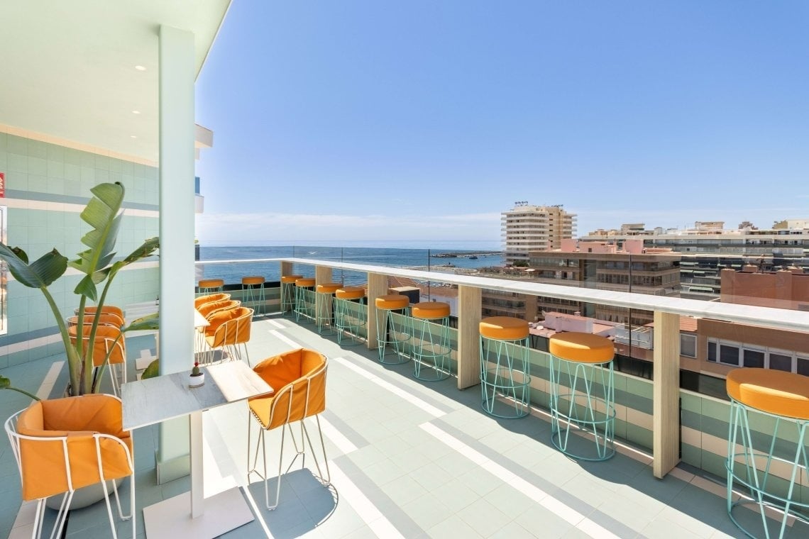 Orange seats with view across Fuengirola at Hotel Angela