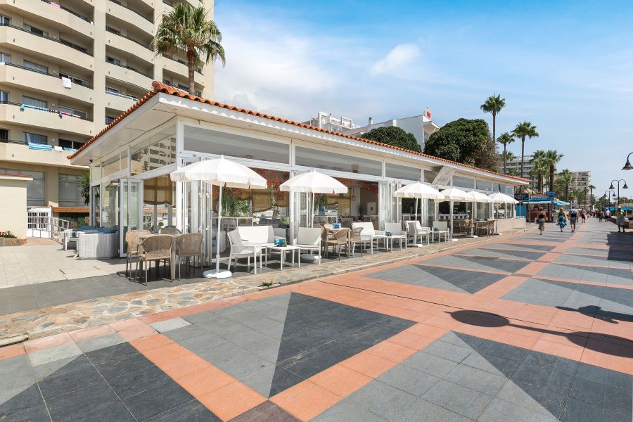 Front of hotel with bar on promenade at Sol Puerto Marina
