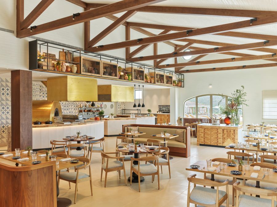 Dining area at Viceroy at Ombria Algarve with exposed wooden beams